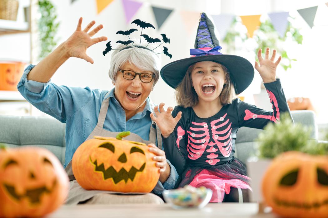 family enjoying Halloween activities together